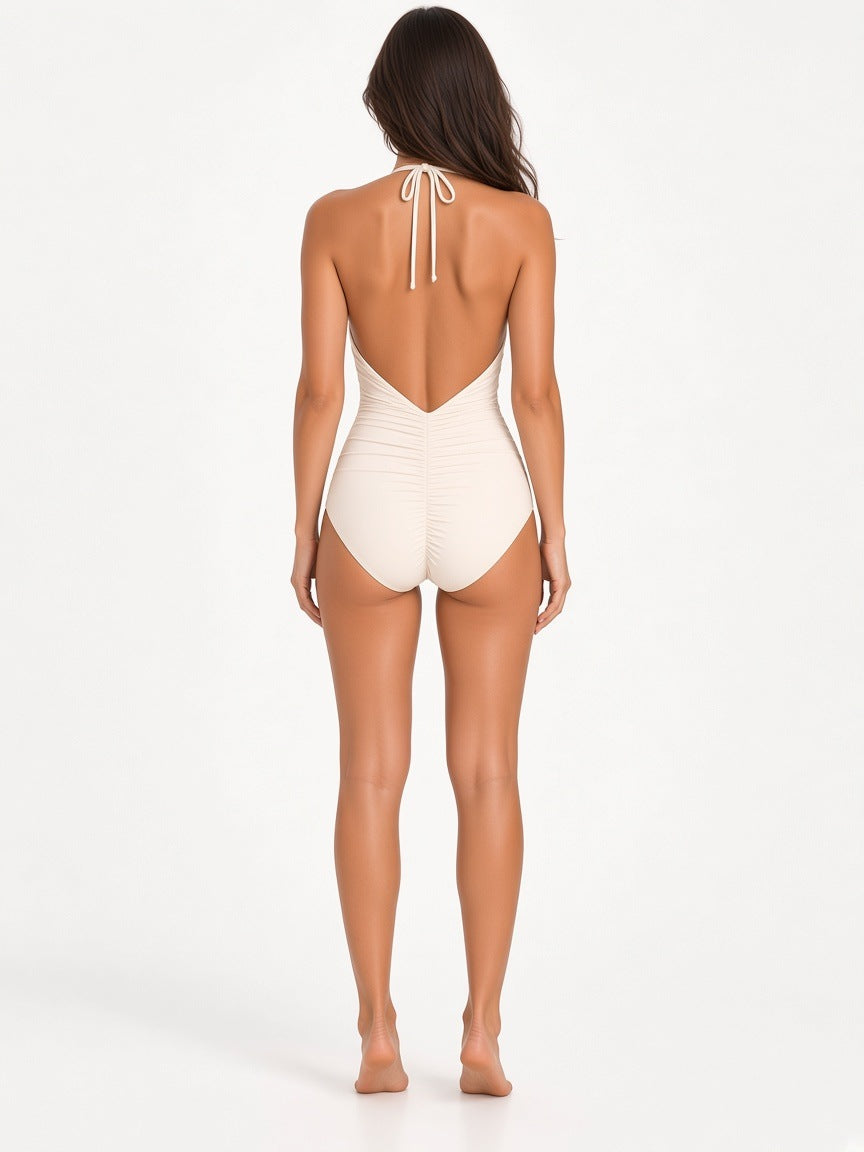 Ivory White ruched halter one-piece swimsuit on model, back view